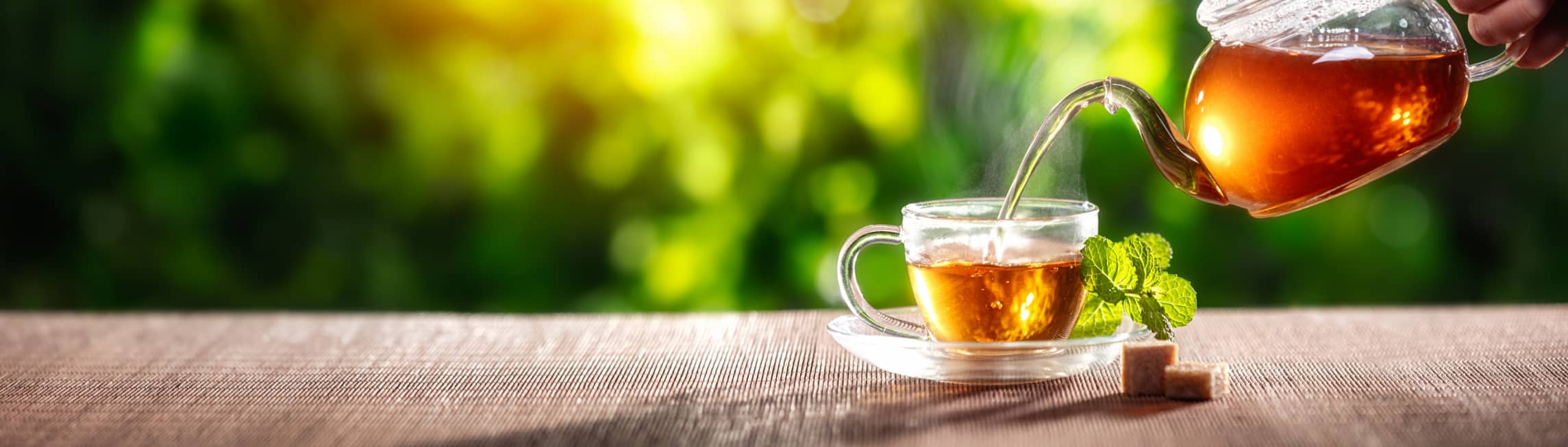 Tea on a picnic bench outside